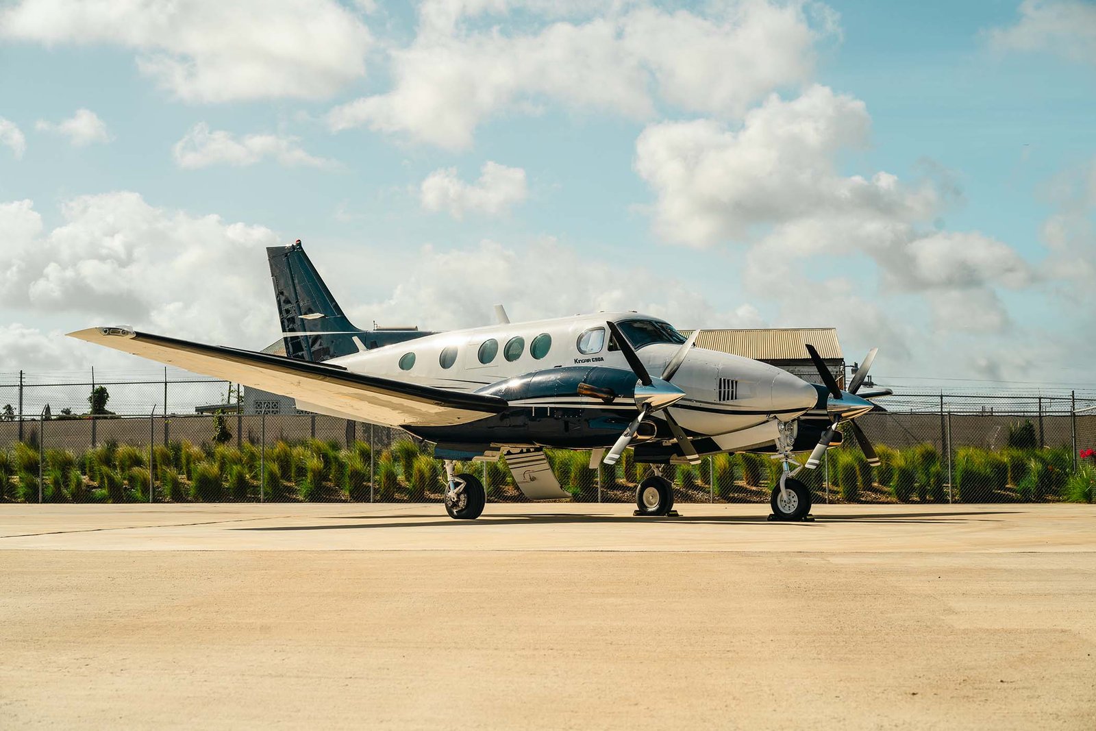 King Air 90 displayed on the ramp from the left side